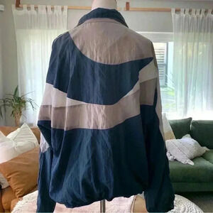 Max Gregor navy and grey windbreaker